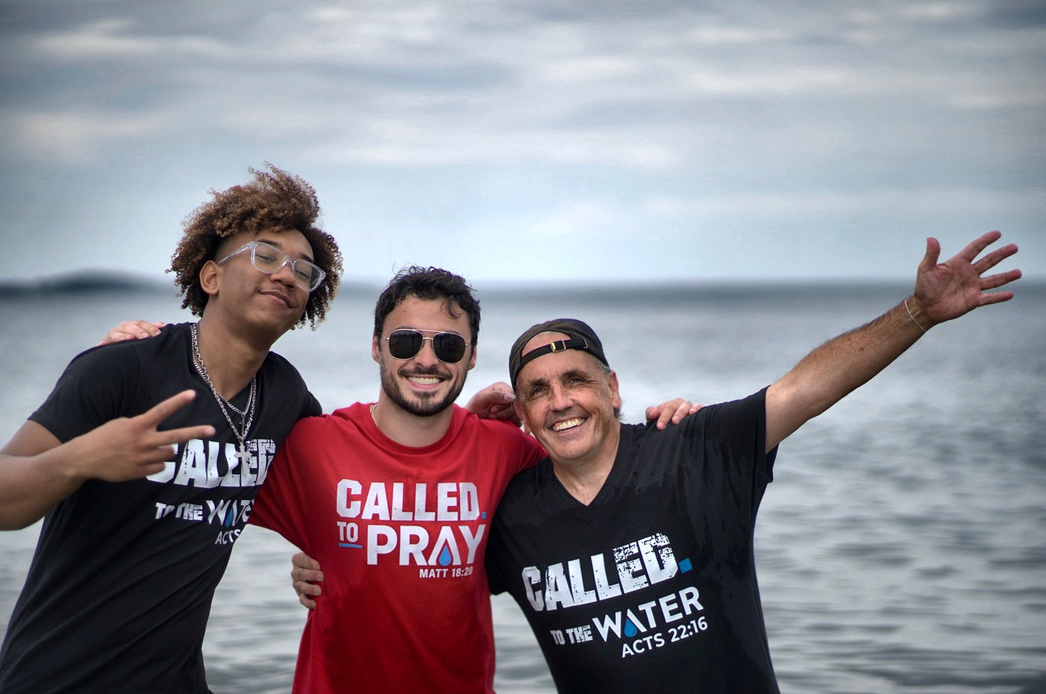 Baptism volunteers together at the beach